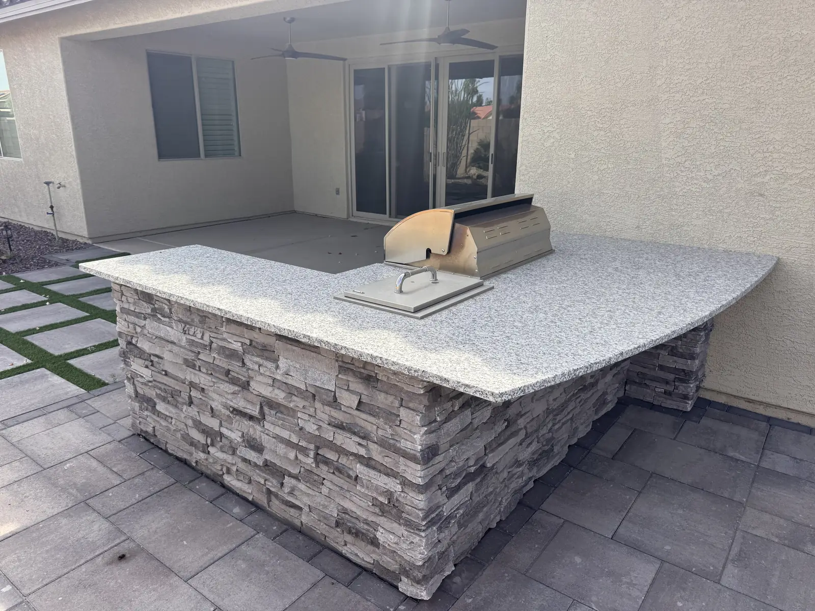 Covered outdoor kitchen and pergola in Queen Creek, AZ